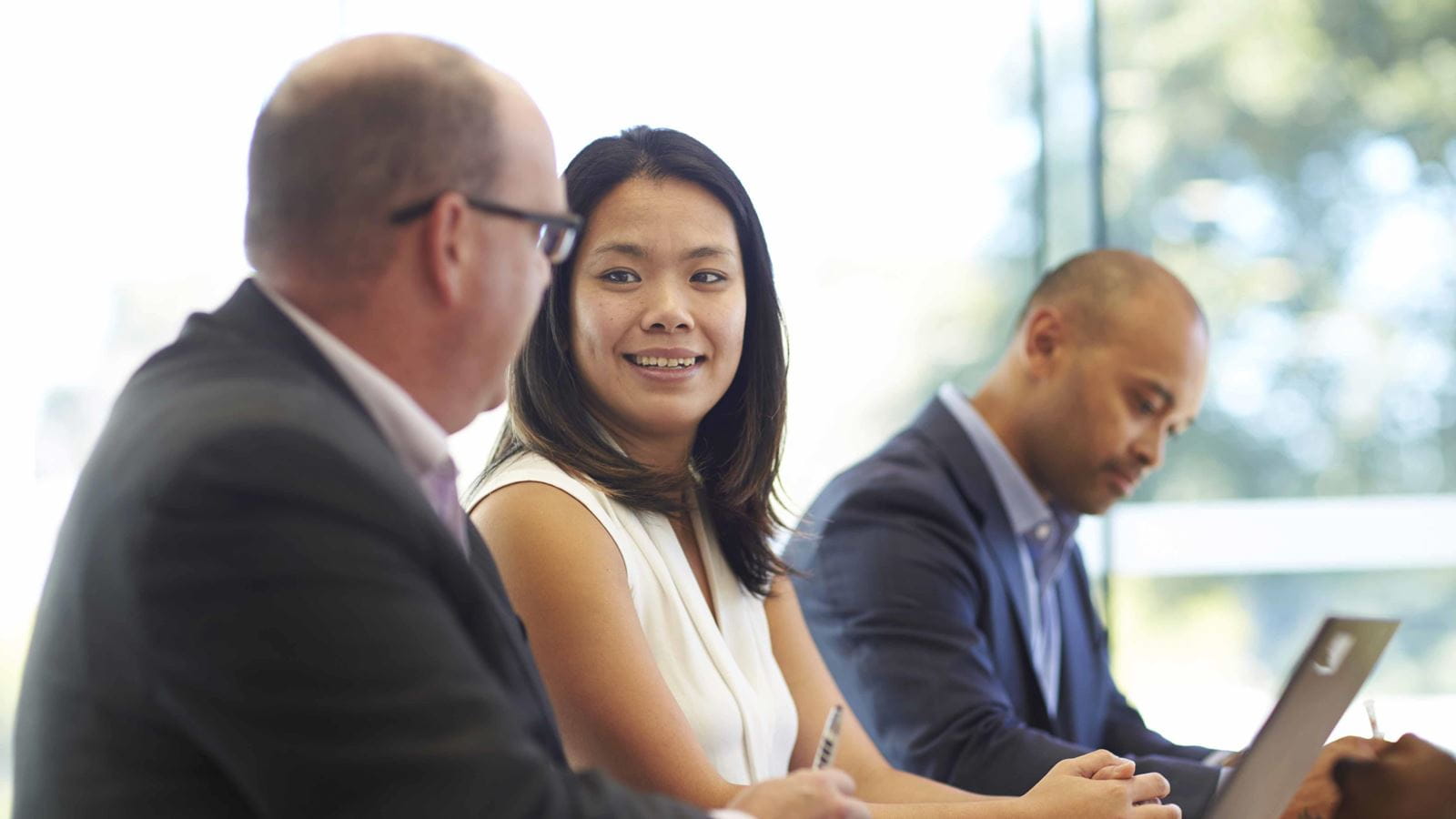Diverse employees at a meeting