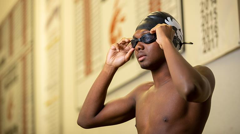 Competitive swimmer Michael Joshua is living with hemophilia B