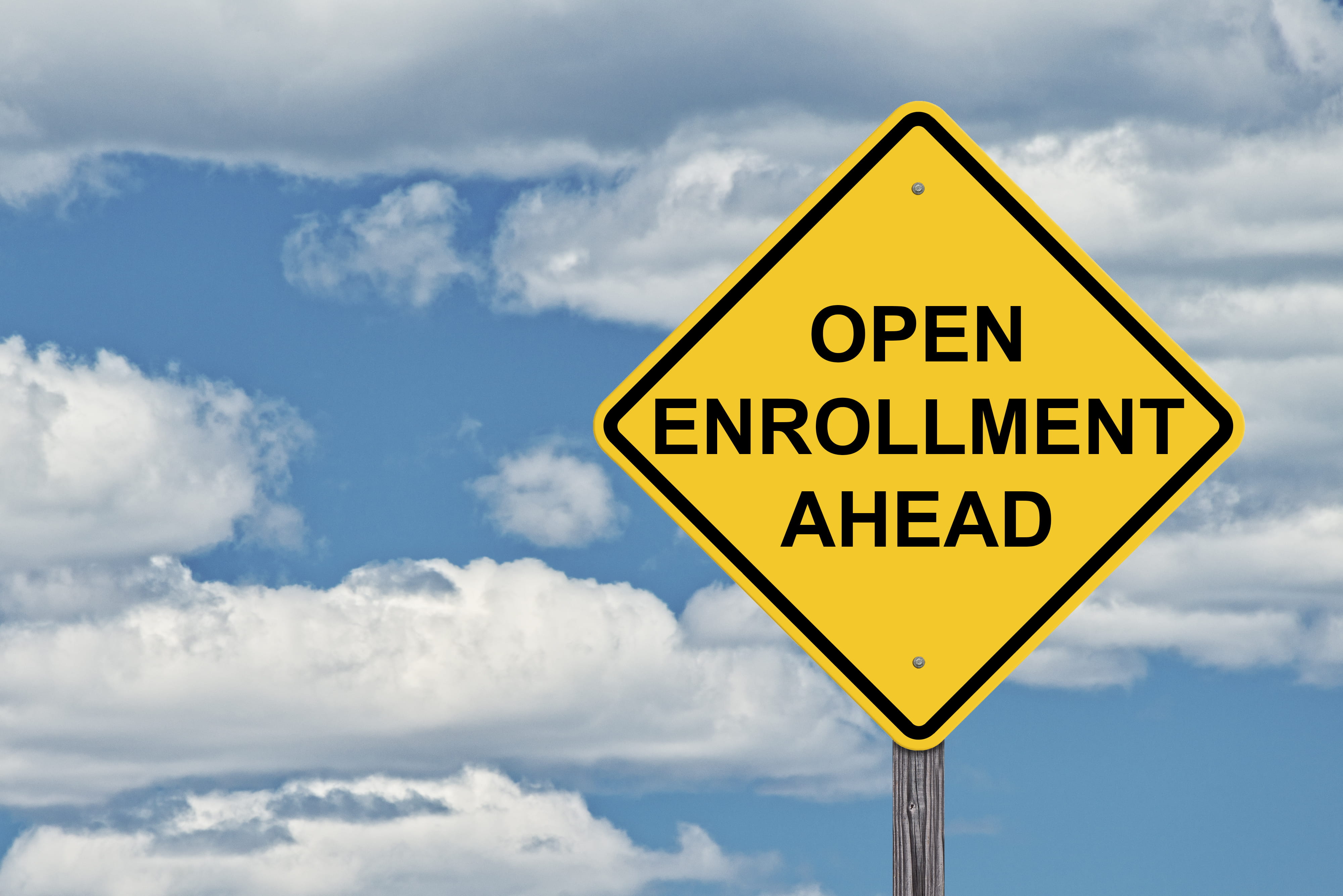 Traffic sign that says Open Enrollment (Getty Image)