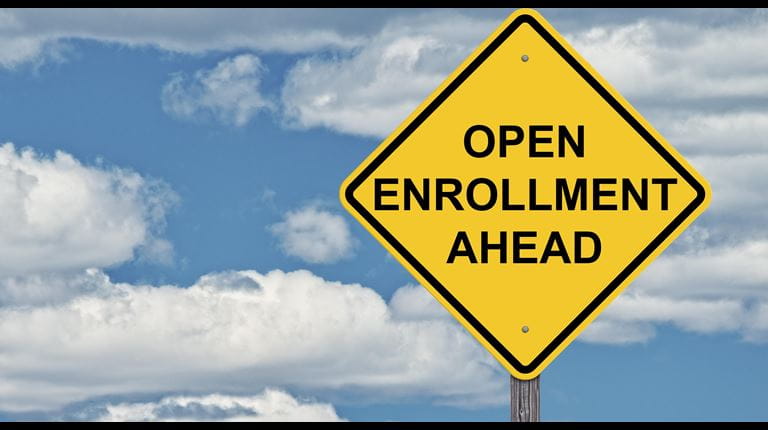 Traffic sign that says Open Enrollment (Getty Image)