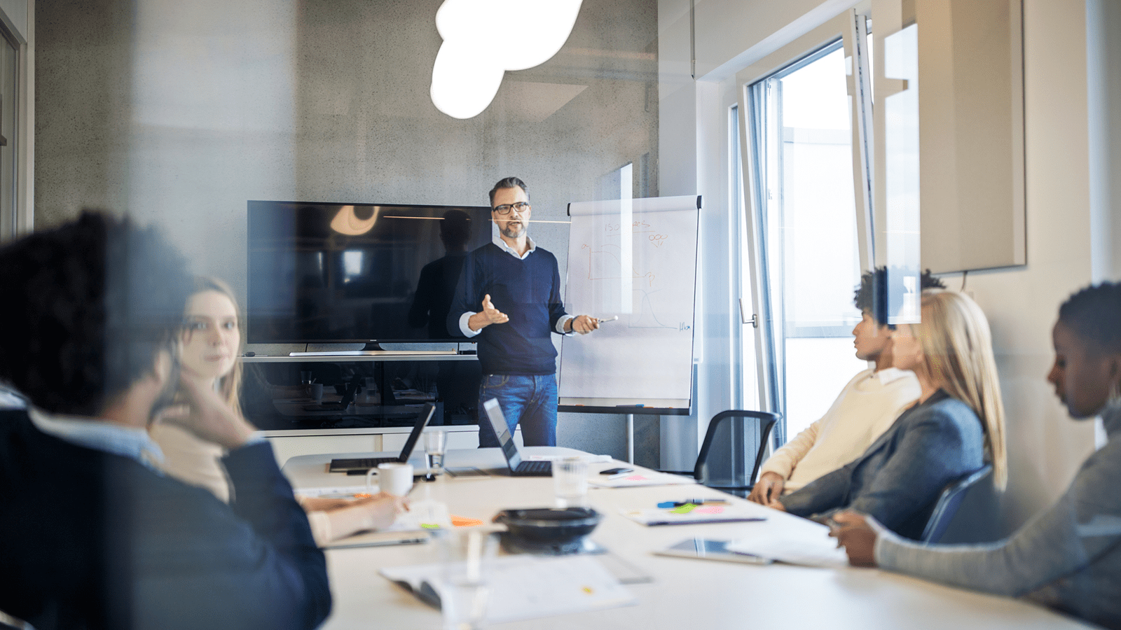 team having a discussion in a meeting room