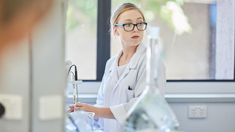 Sequiris female researcher in a laboratory