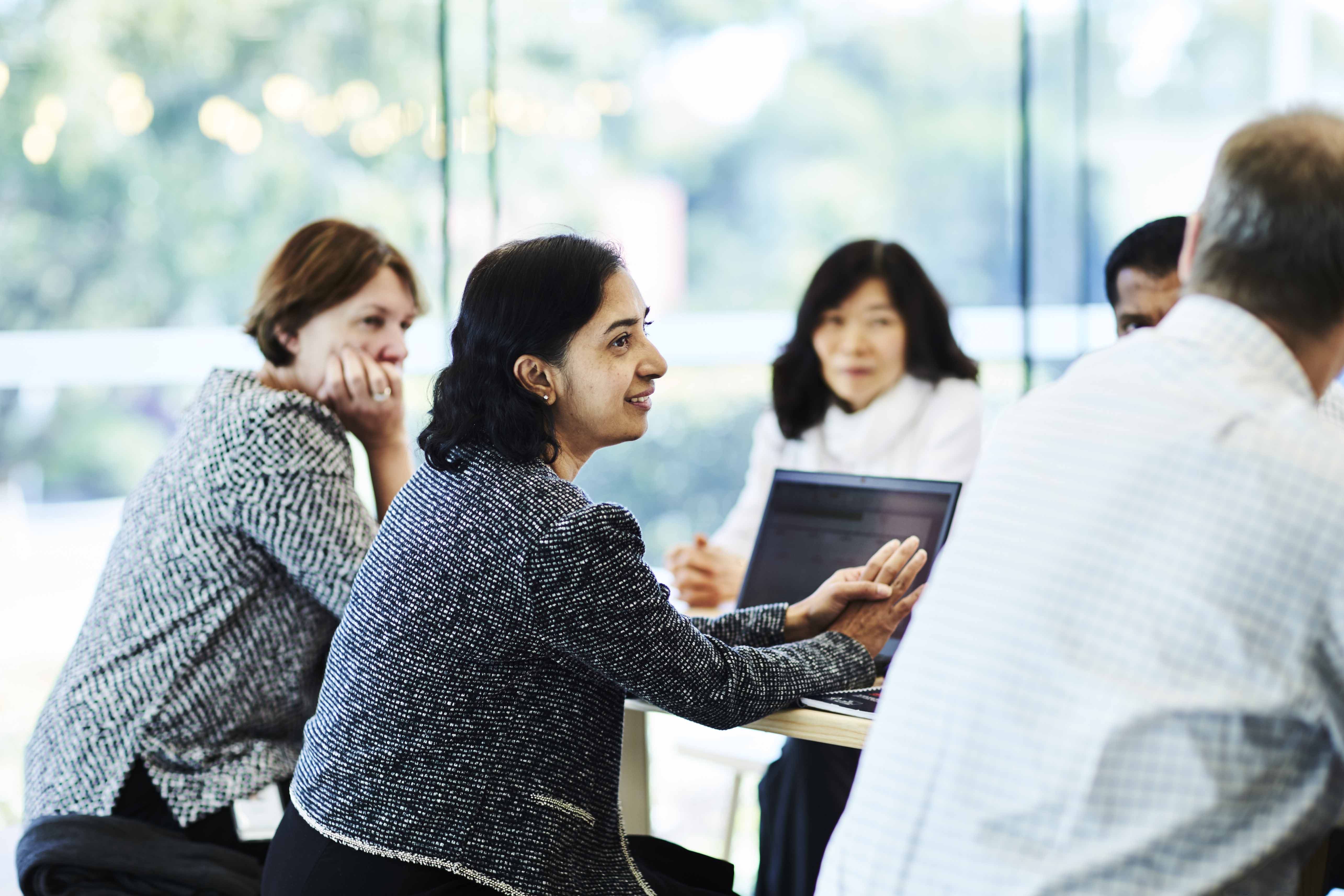 People talking in office
