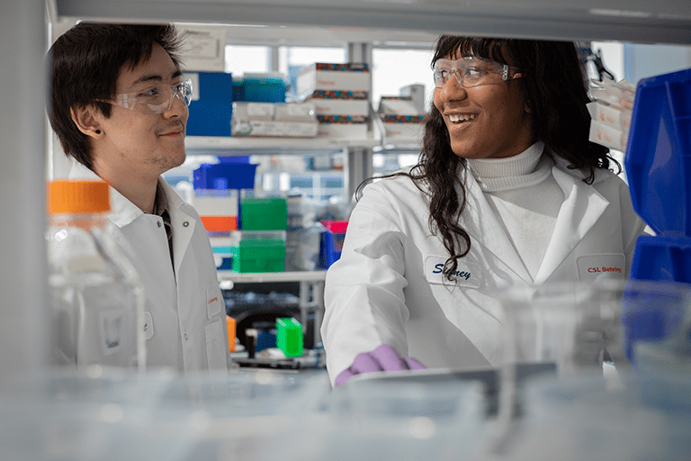 Image of male and female colleagues in a laboratory 
