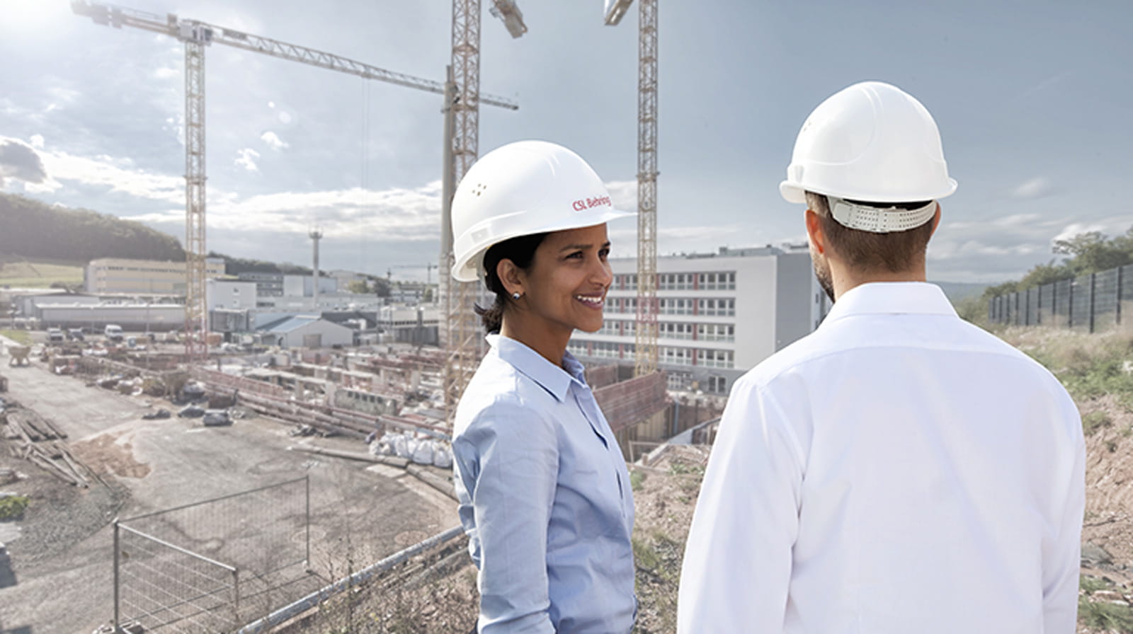 Infrastructure and strategy two people on a construction site