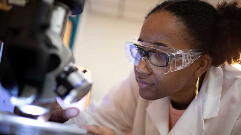 Woman with microscope