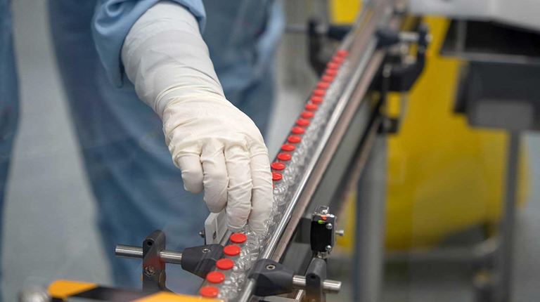 Bottles on assembly line