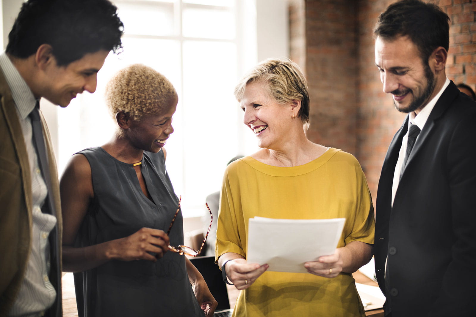 Diverse group talking and smiling