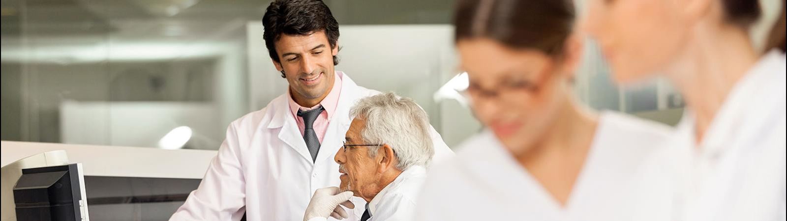 Gender and age diverse researchers in a lab