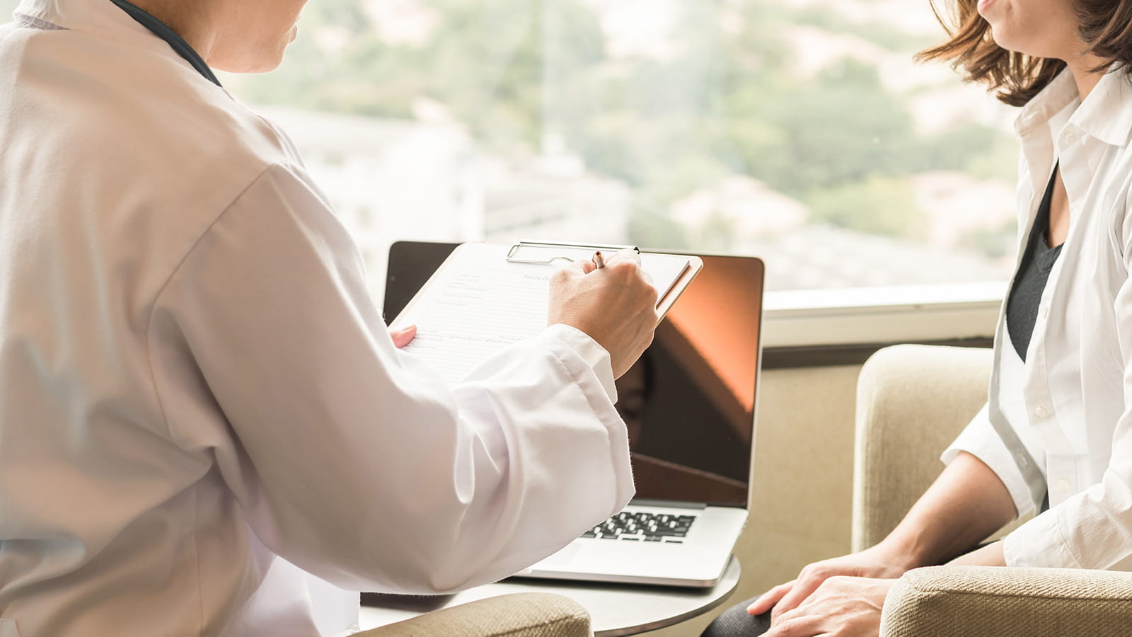 Interviewer taking notes