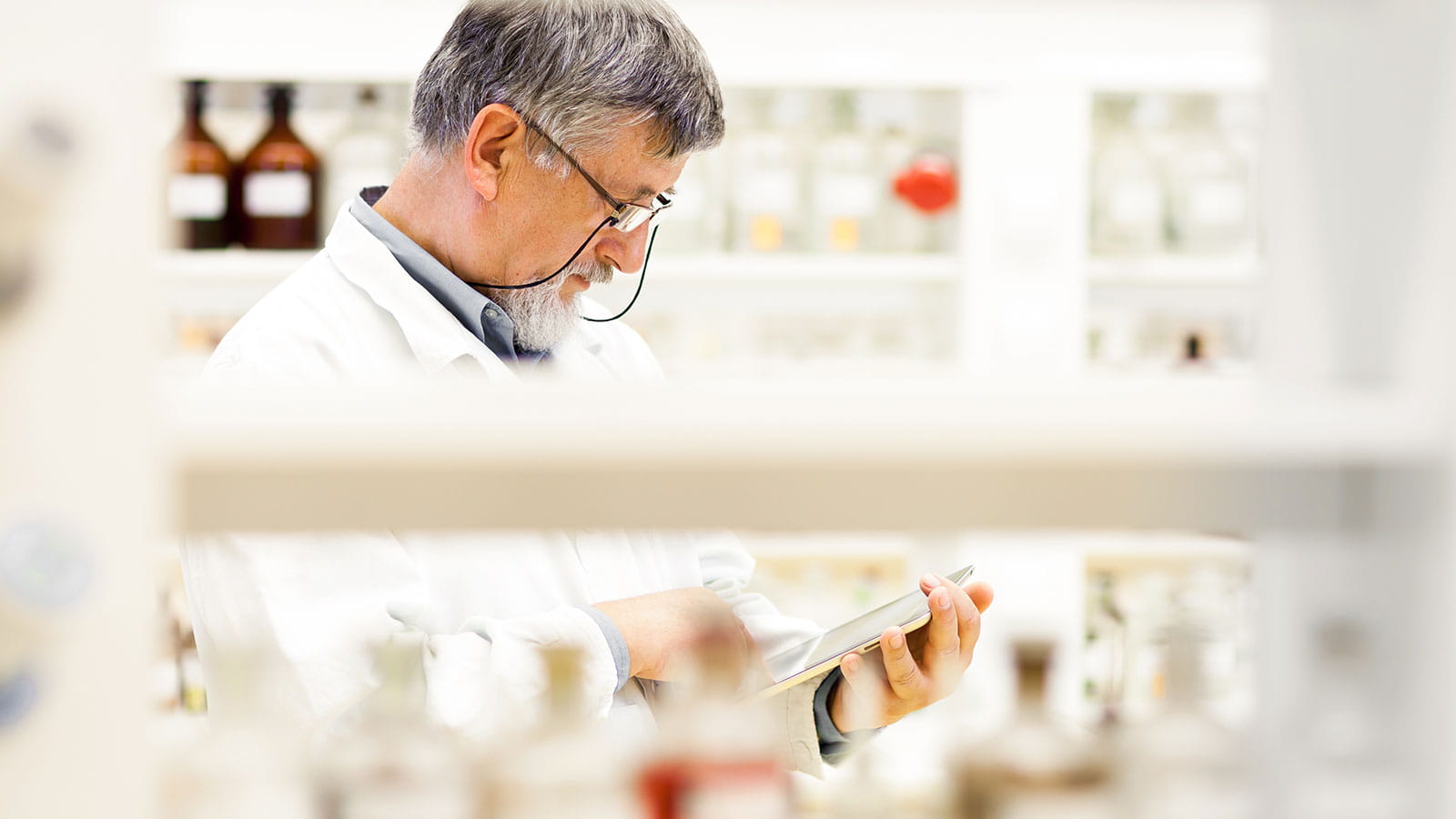 Researcher looking at notes