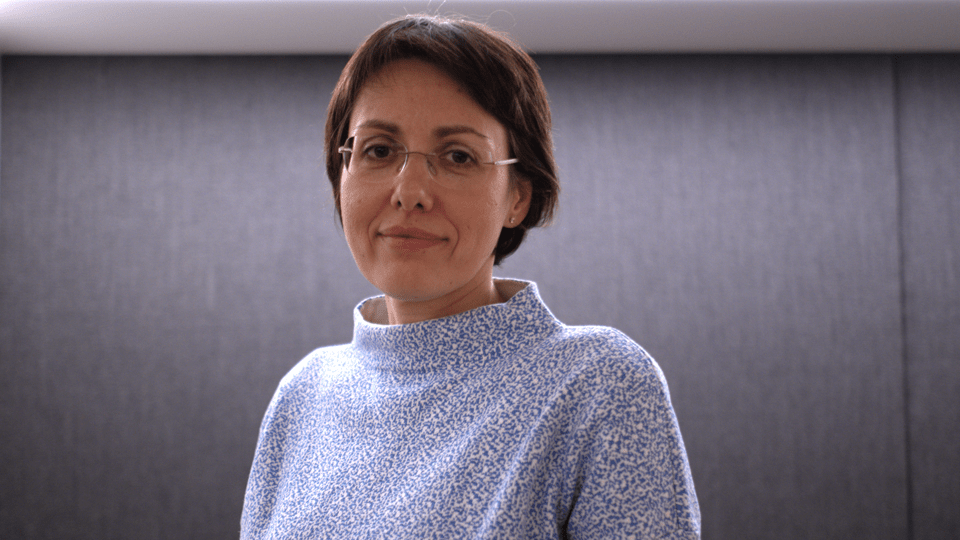 Picture of Olga Neumueller in an office setting