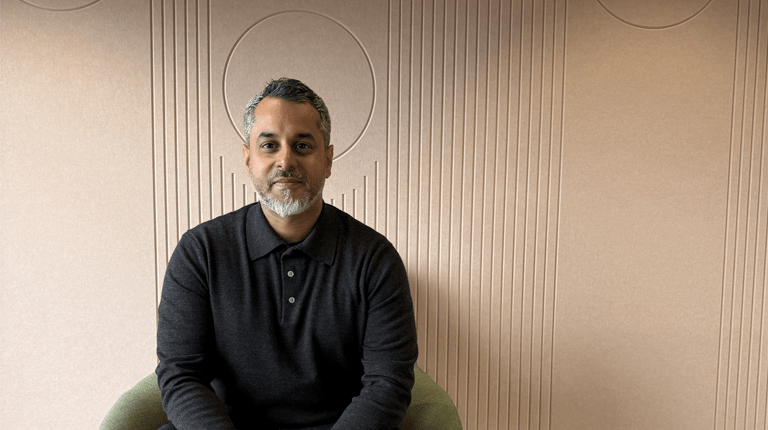 Photograph of Rishi Chopra looking into camera smiling
