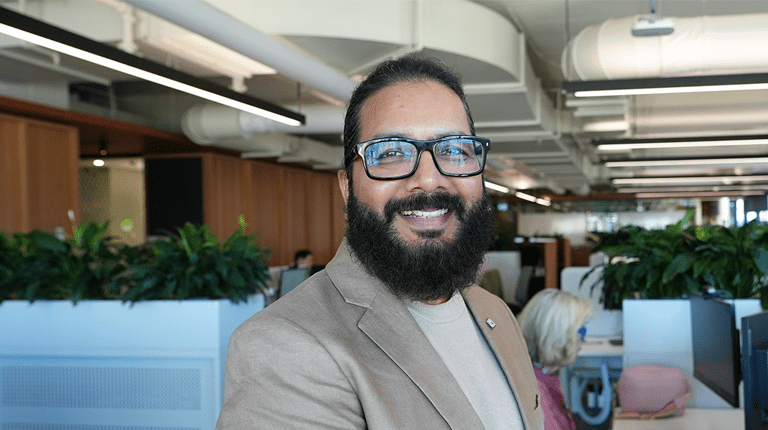 Photograph of Sunil Kumar Raja in an office environment