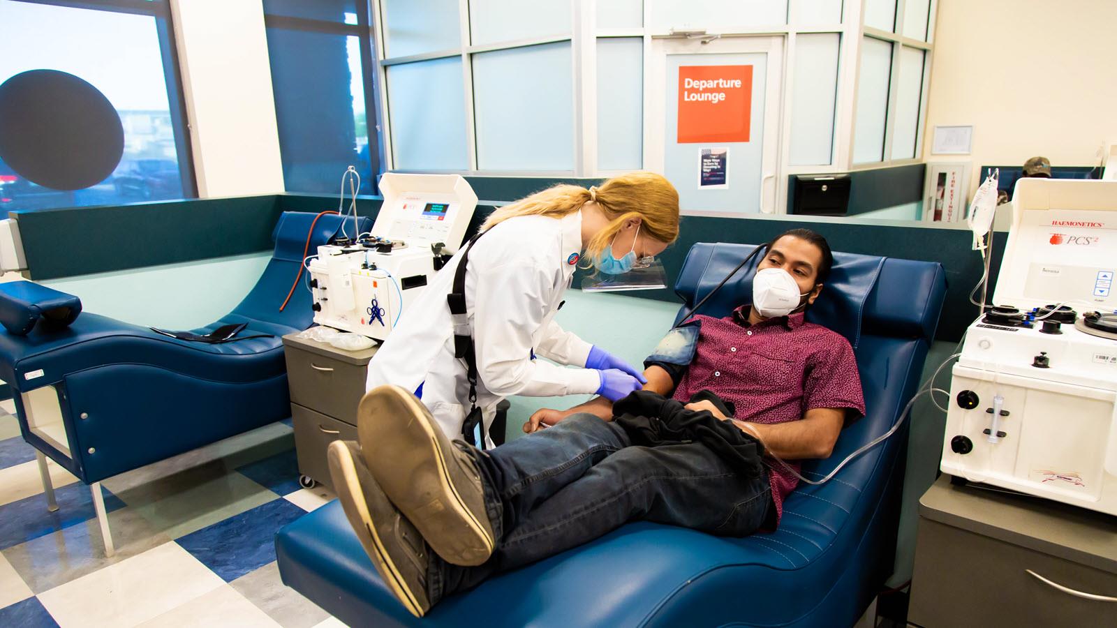 Masked plasma donor during a donation