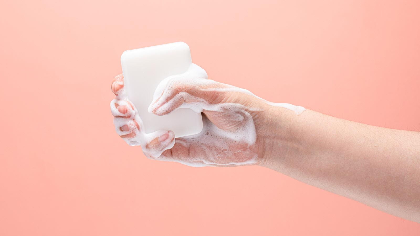 hand holding a bar of soap