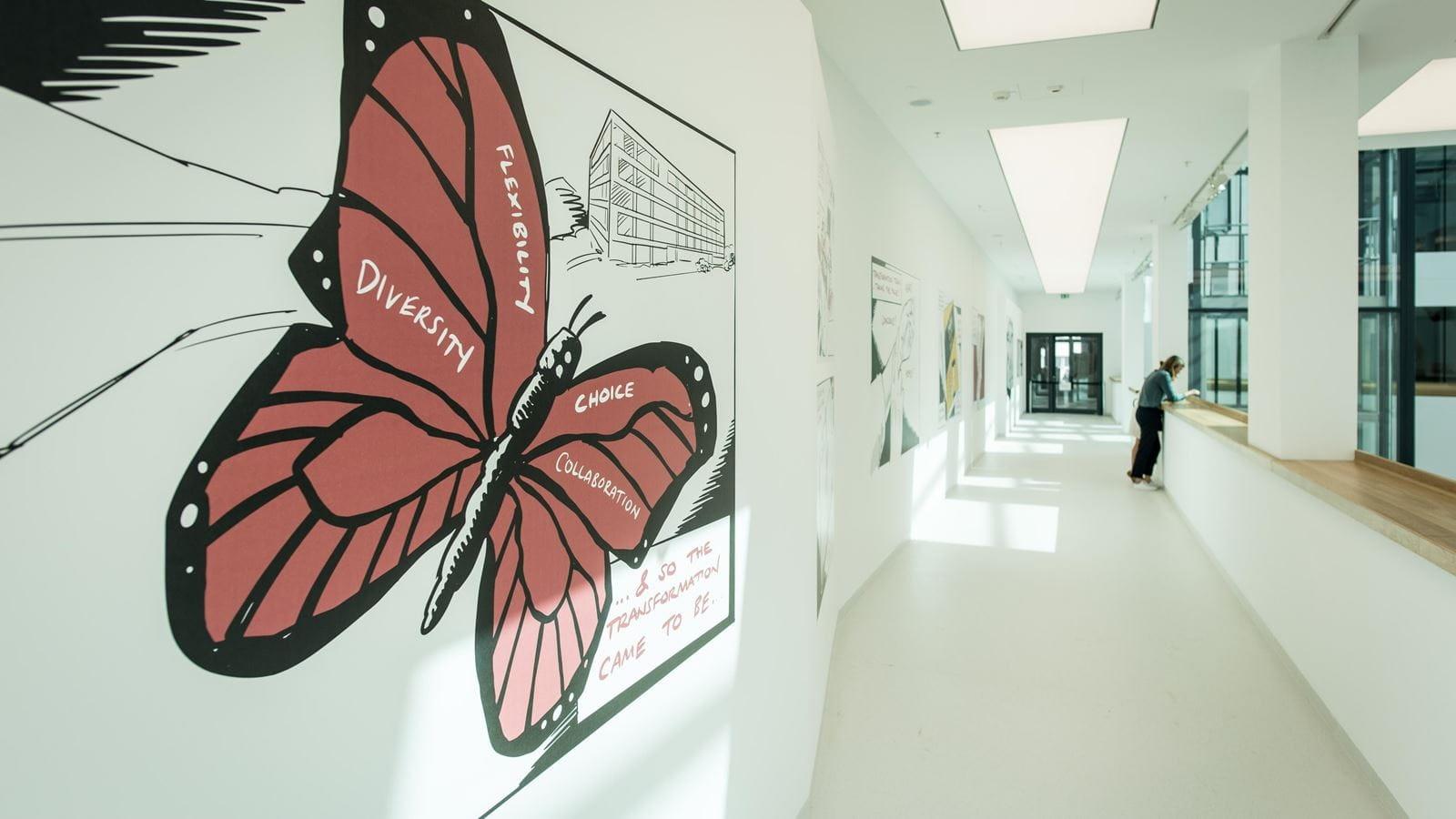A butterfly illustration in the hallway of the M600 R&D building.
