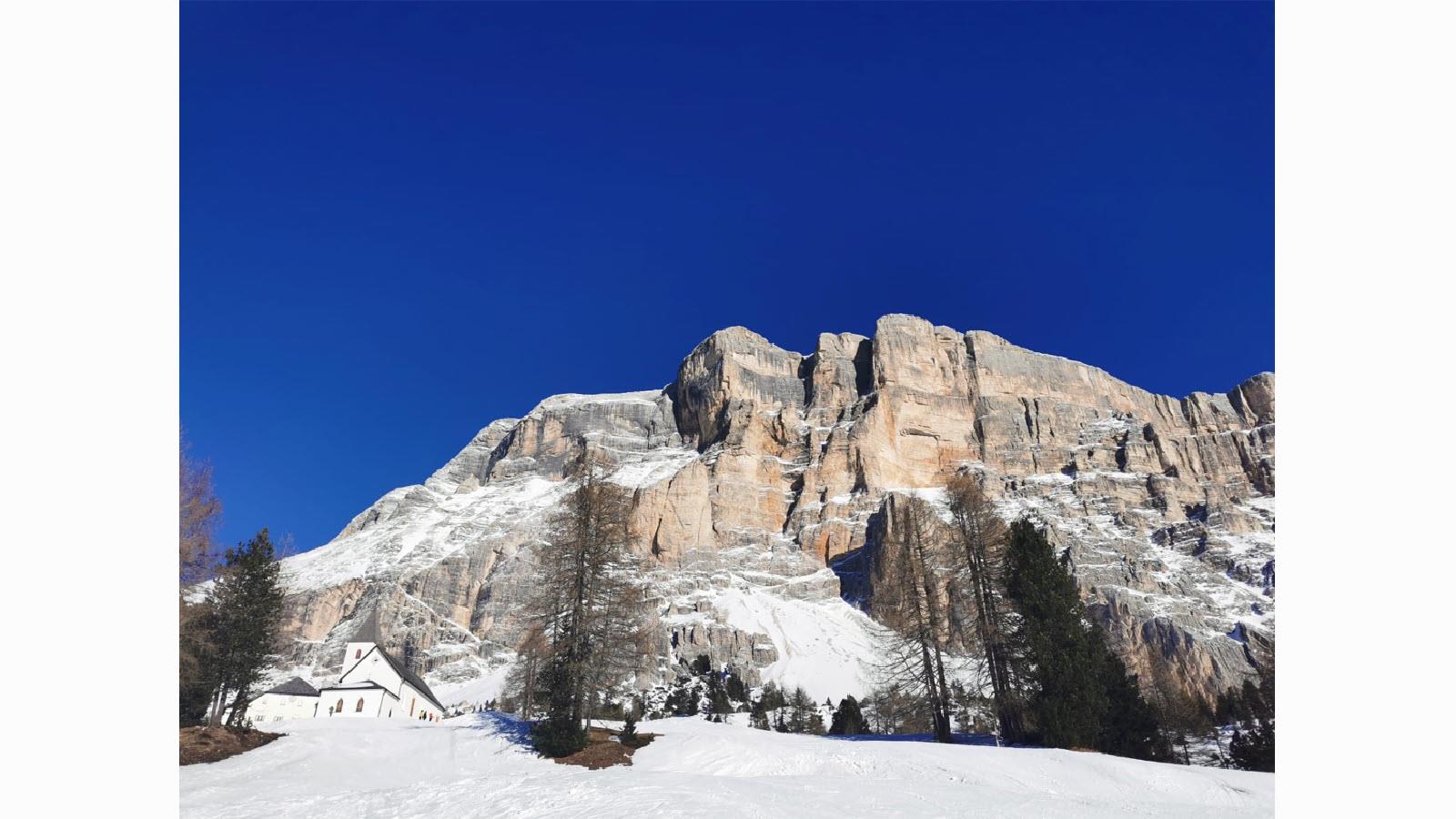 Santa Croce Mountain in Italy with snow and cloudless blue sky