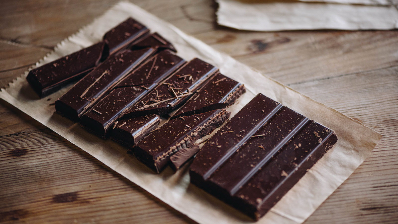 bars of dark chocolate on waxed paper