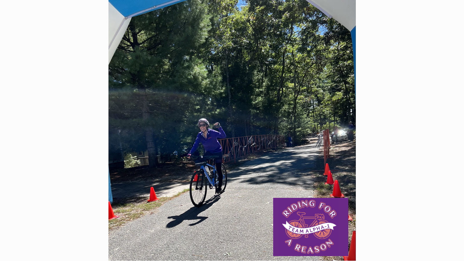 A member of CSL Behring's cycling team, Ellyn Getz, on her bike during the Alpha 1 ride