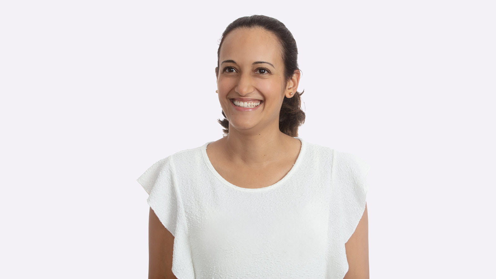 Scientist Genevieve Martin-Roussety standing against a white background