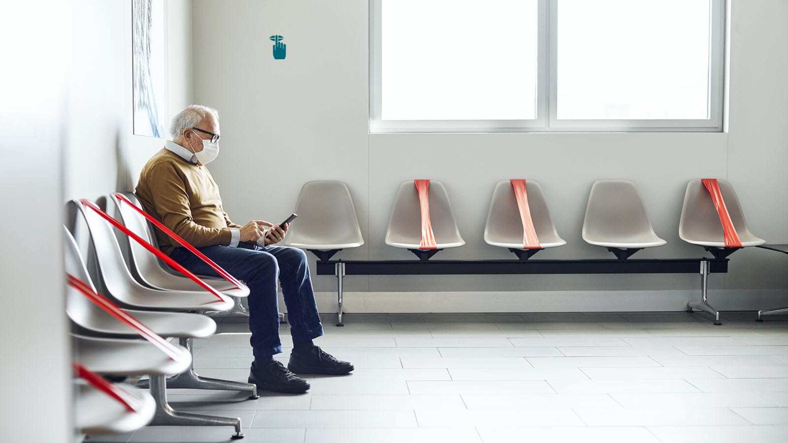 Masked patient waits to see the doctor.