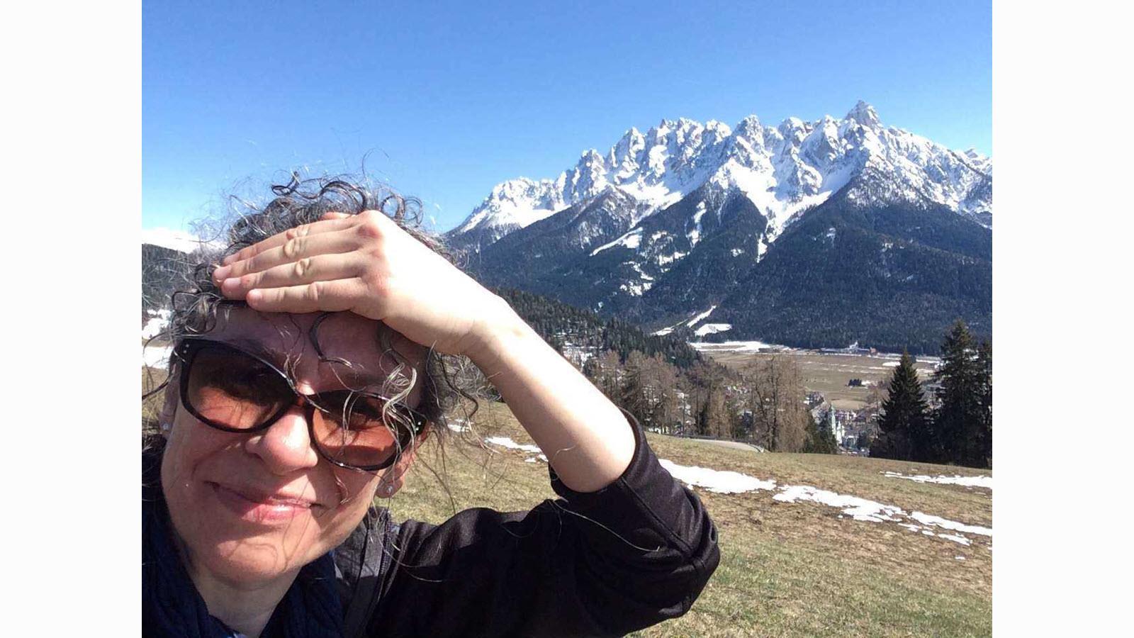 Monica Tavanti, a CSL human factors researcher, with the Swiss Alps in the background