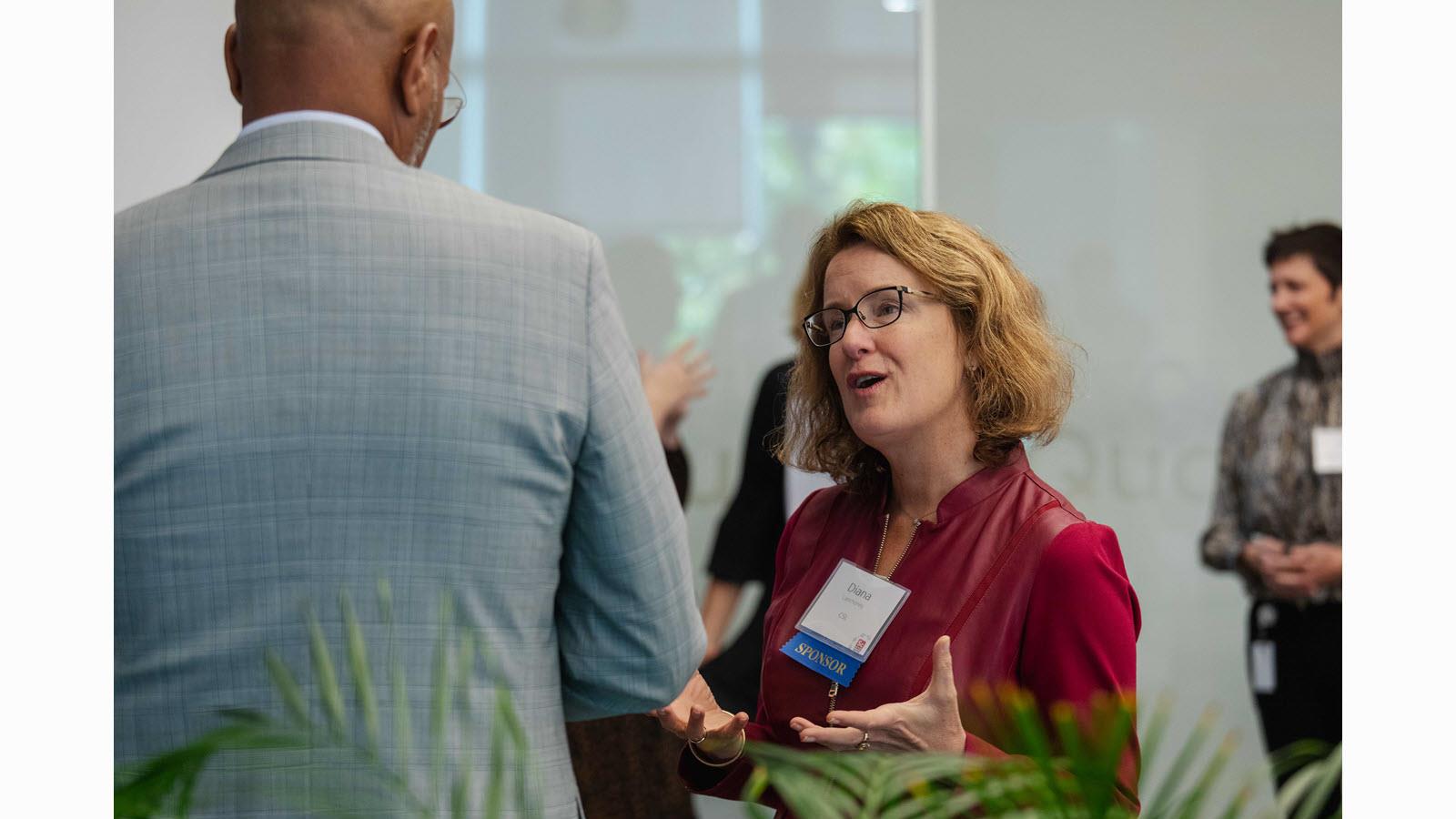 CSL's Diana Lanchoney talks with an attendee at the Nucleus Awards in Philadelphia