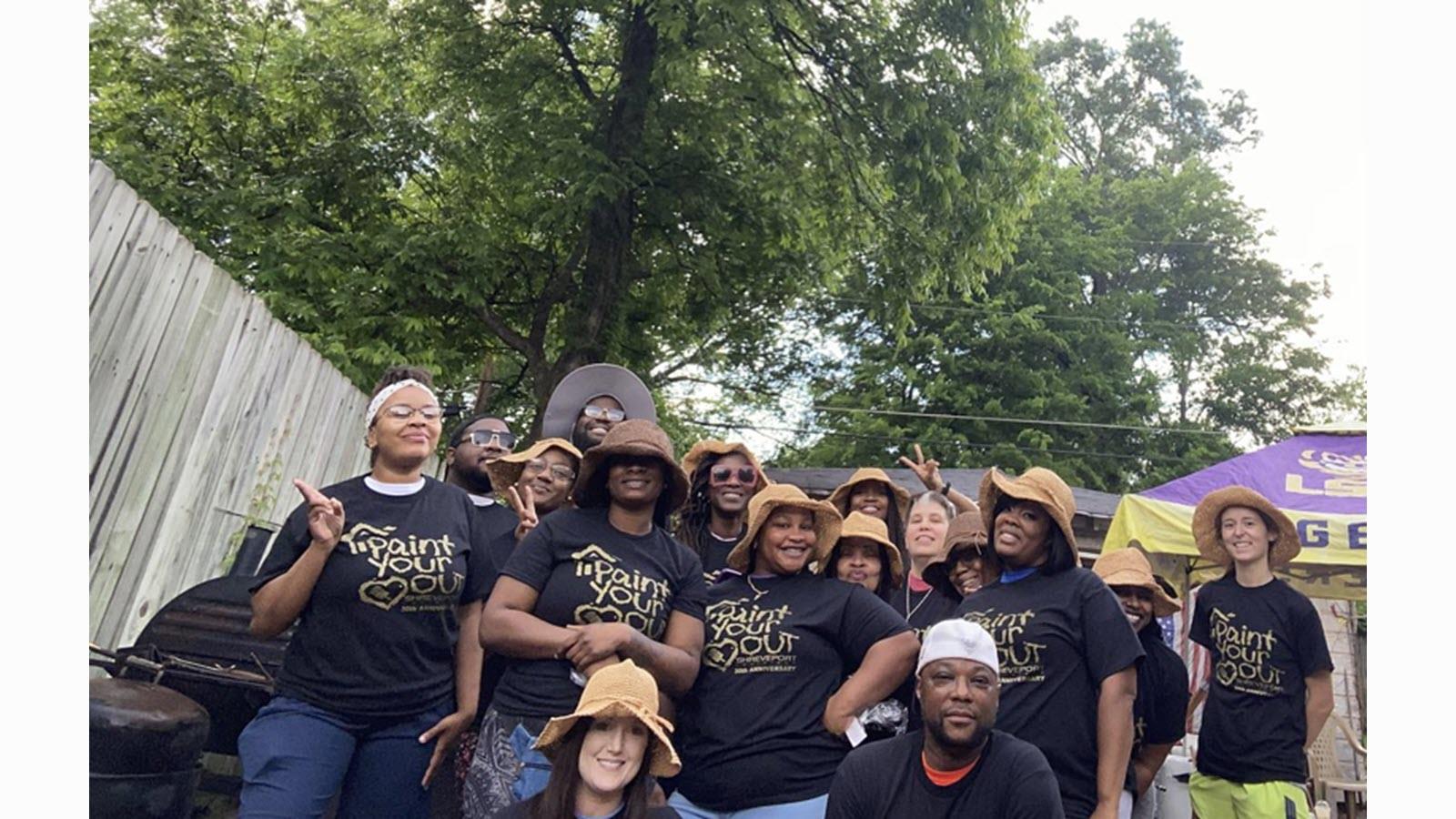 CSL Plasma volunteers who pained a neighbor's home in Shreveport, Louisiana