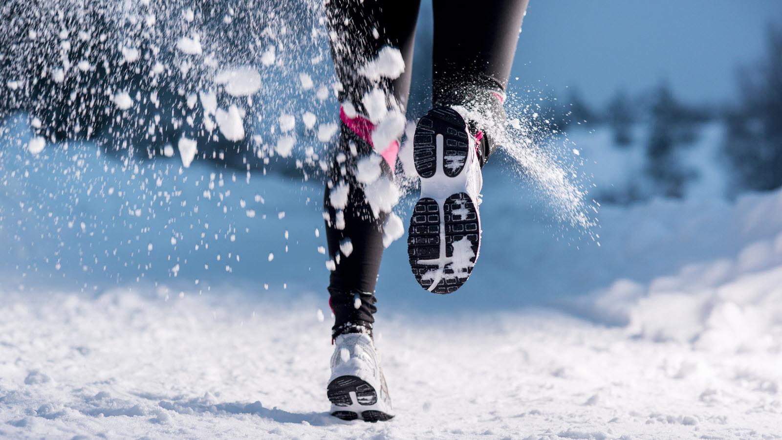 A runner's sneakers in the snow