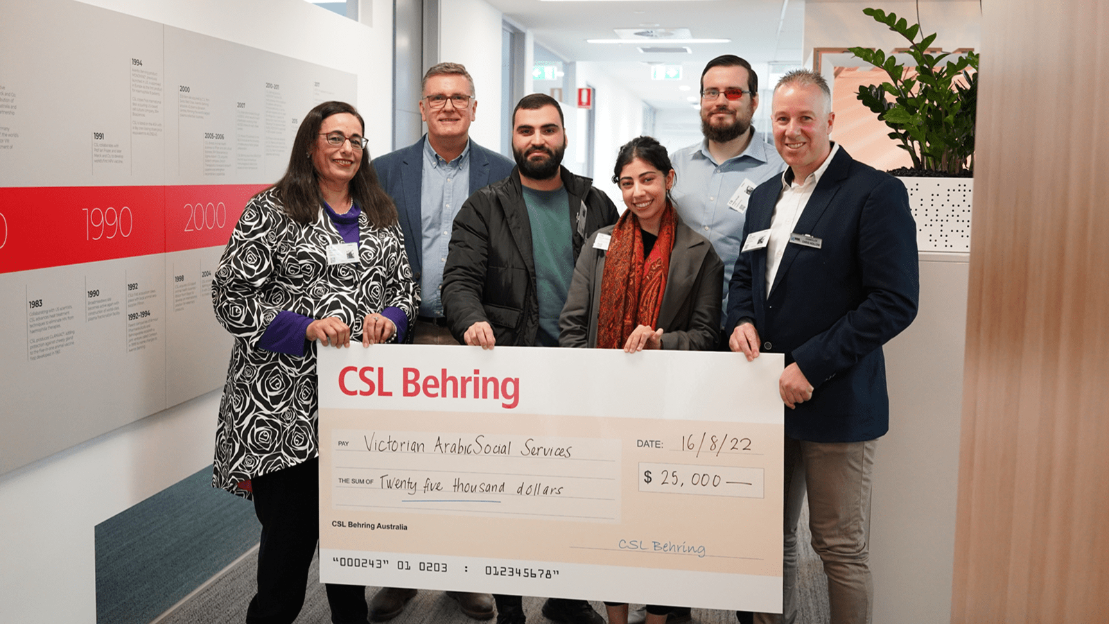 CSL Behring officials present VASS organization with a $25,000 check