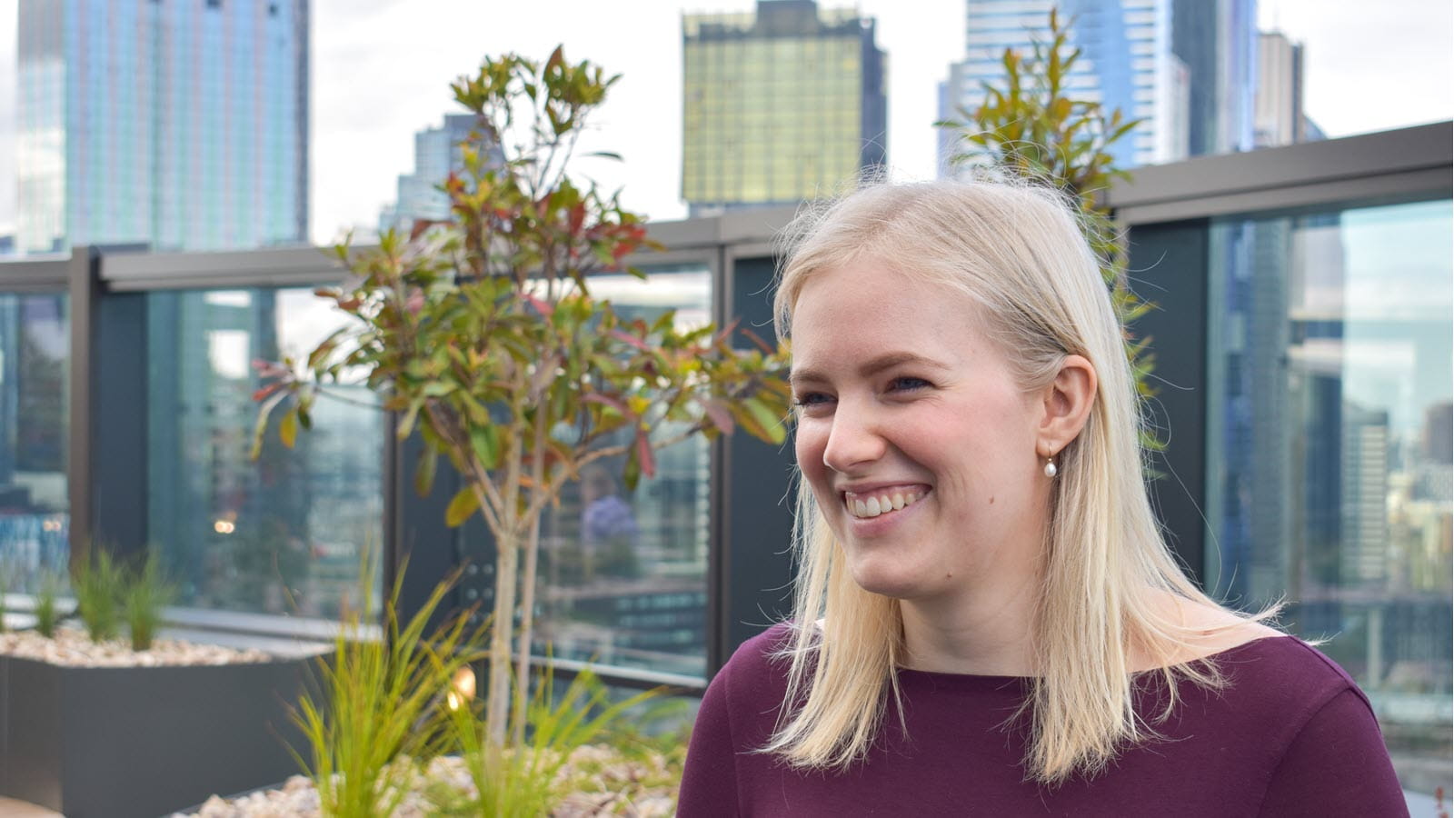 Annika Allen, who is working on CSL's sustainability goals, on an office building rooftop
