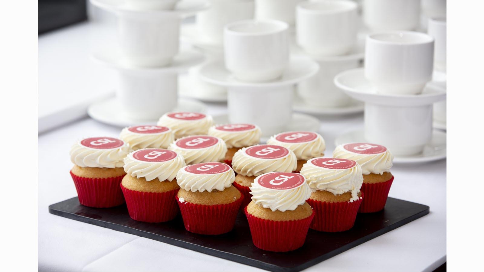 CSL cupcakes with the company's red logo