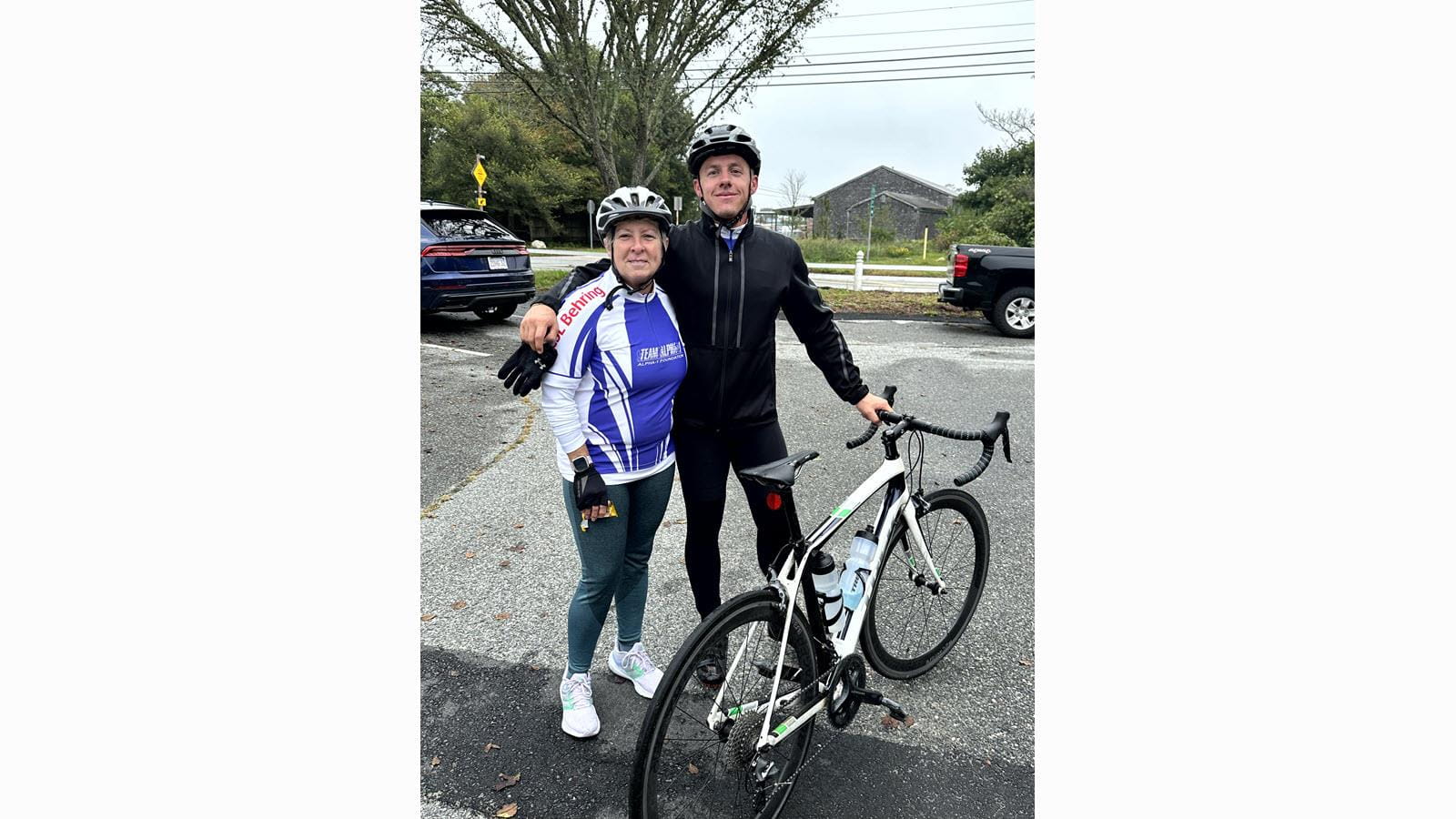 Two participants in the Escape to the Cape Bike Trek during a dry moment in the wet weekend