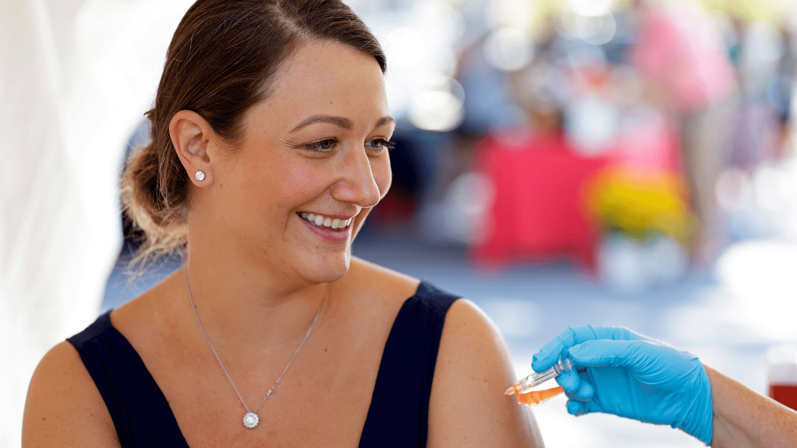 Melissa Troop receives a flu shot
