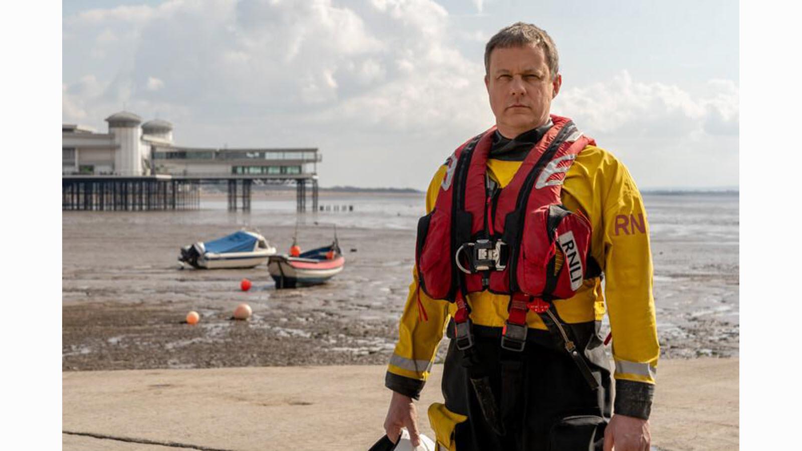 Mike Buckland, waterside, in gear for doing water rescues
