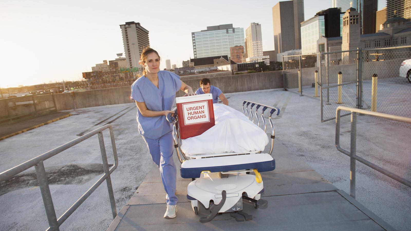 Photo illustration of a team delivering an organ for transplant