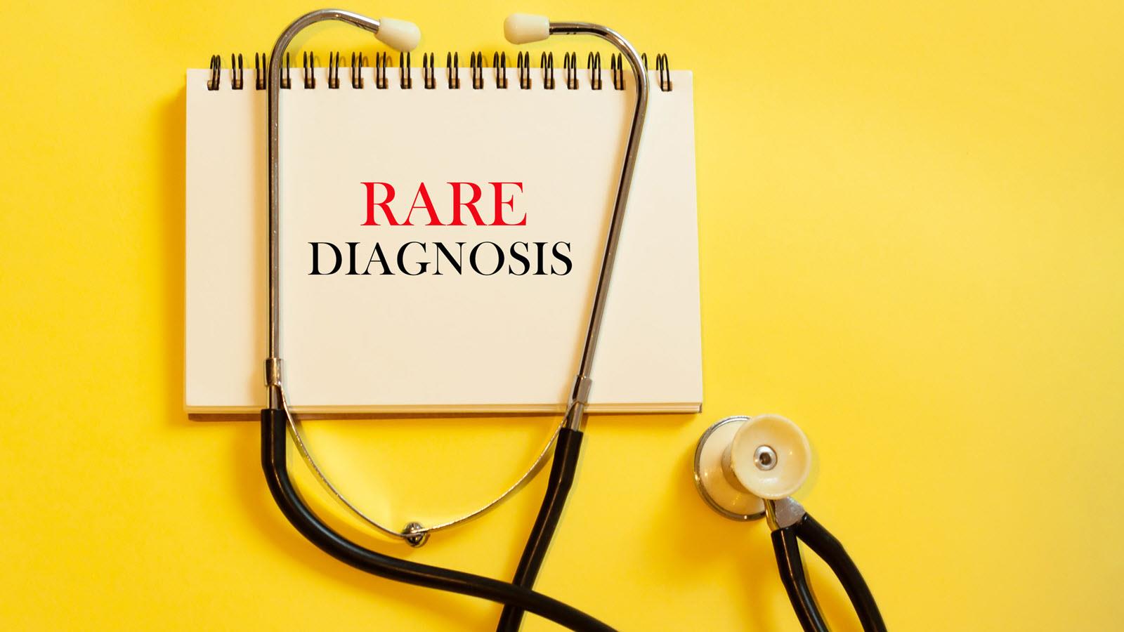 notepad that says rare diagnosis alongside a stethoscope