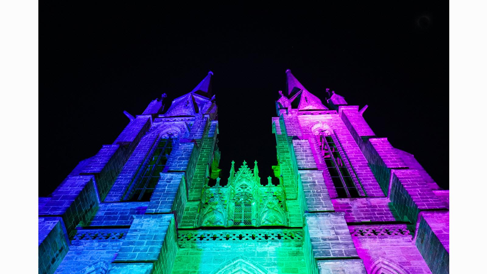 The spires of St. Elizabeth Church in Marburg, Germany, lit up for Rare Disease Day 2023.