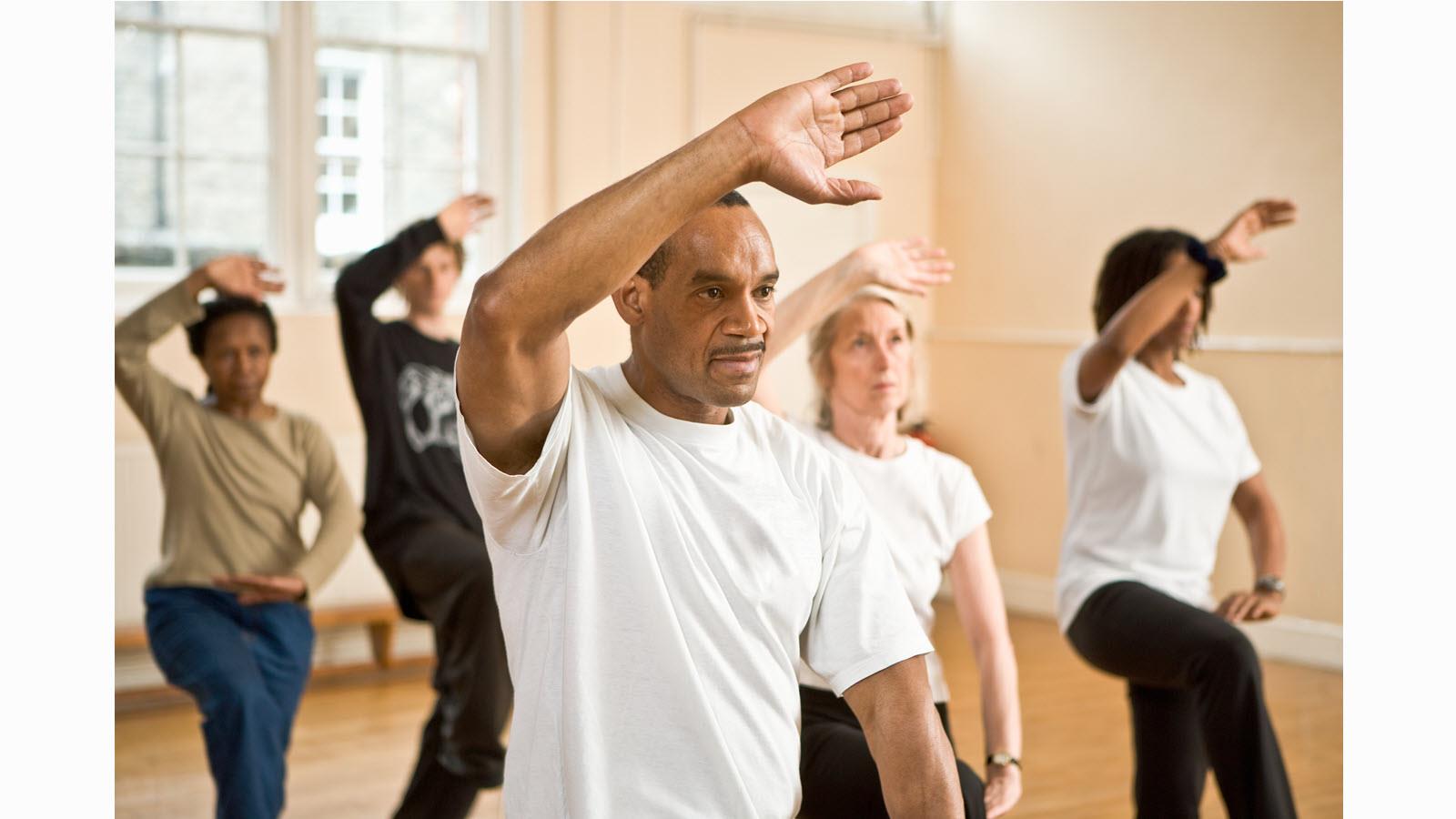 A group of people in a Tai Chi class