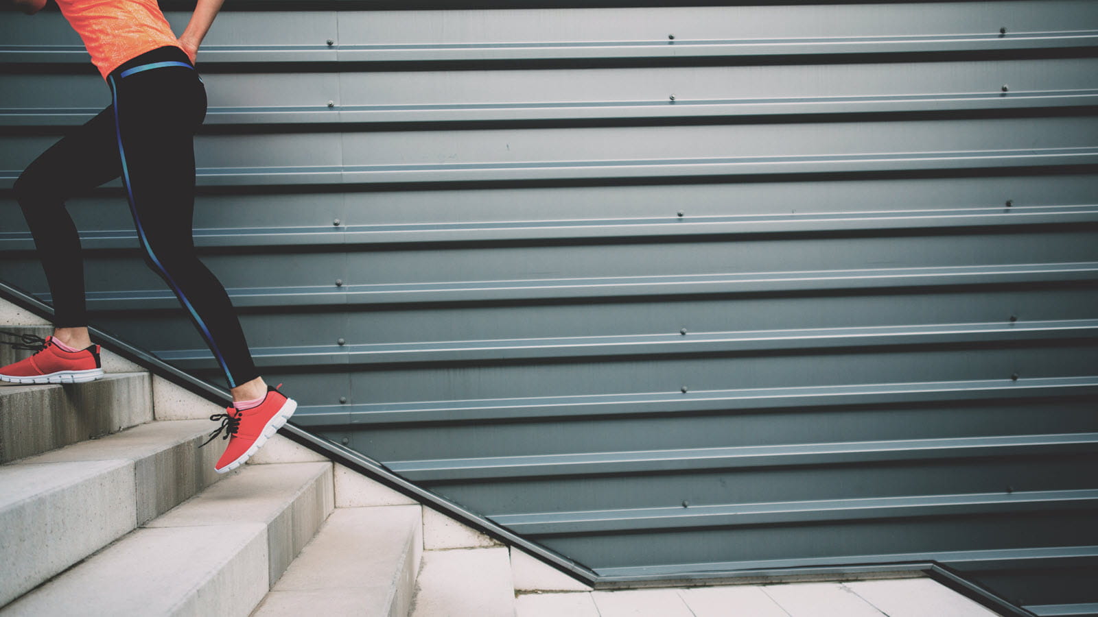 Woman climbs stairs for exercise