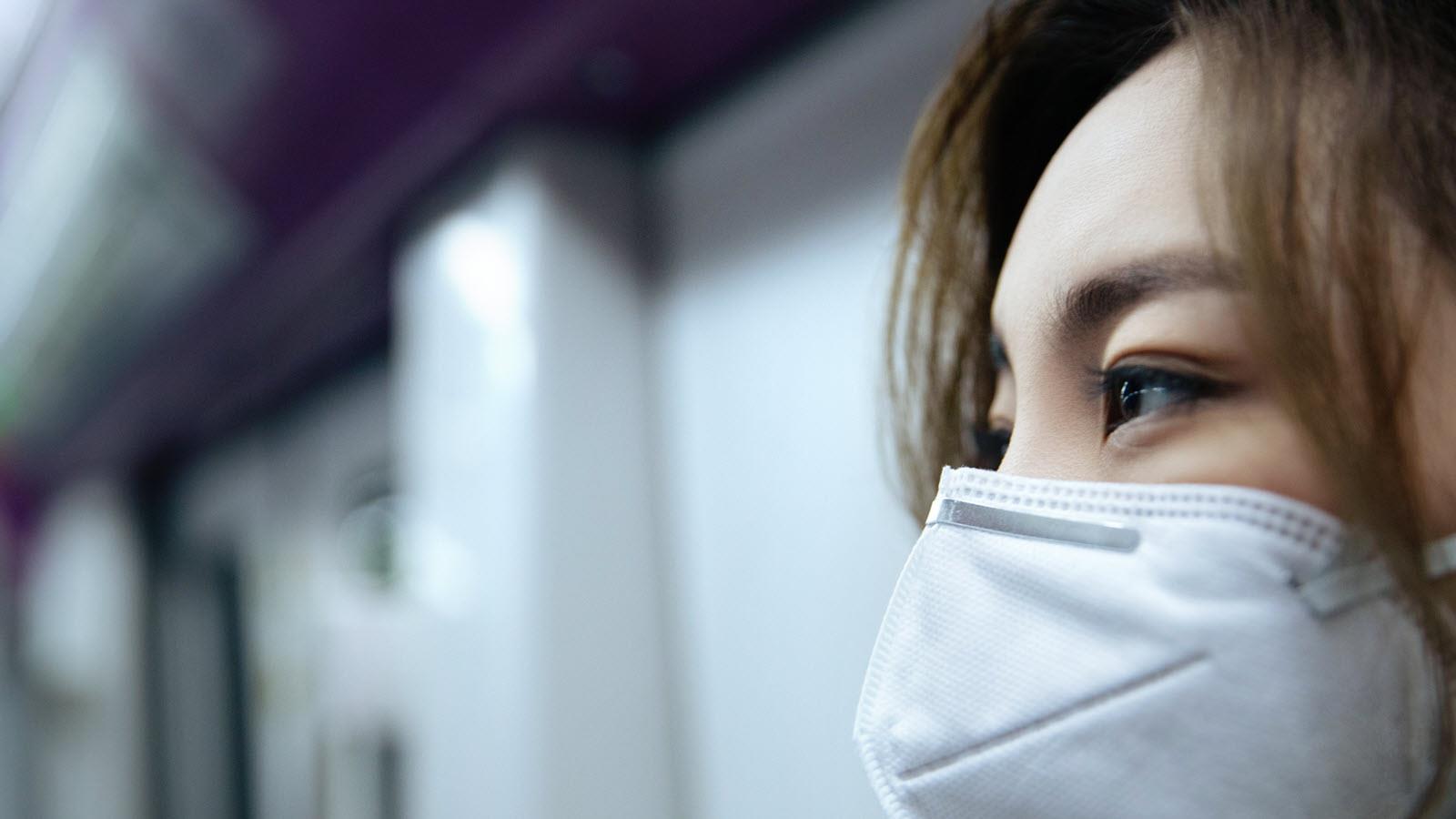 woman wearing an N95 face mask