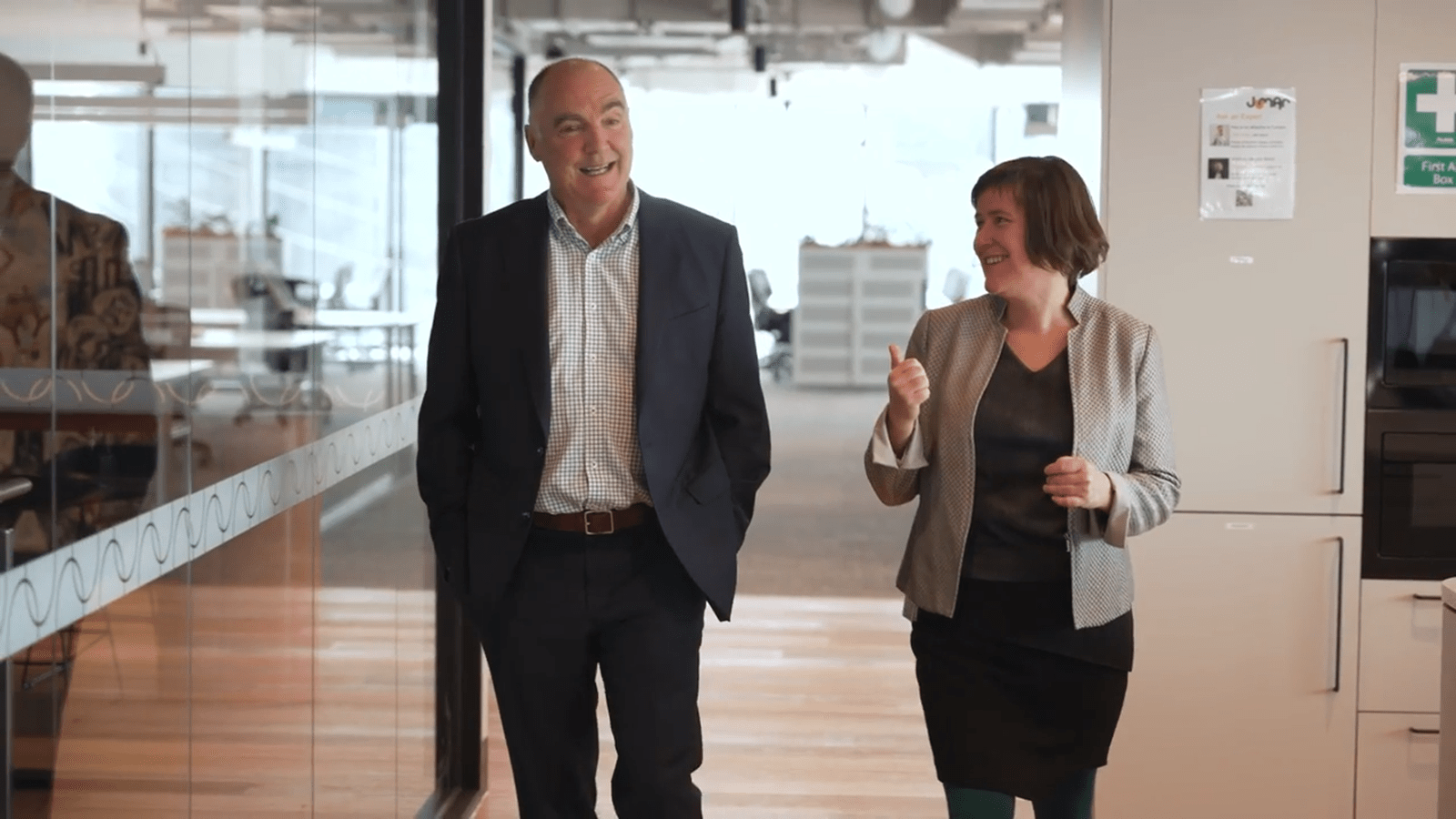 Dr. Andrew Nash, Chief Scientific Officer, Senior Vice President Head of Research at CSL, walks with Camille Shanahan, General Manager of Jumar Bioincubator.