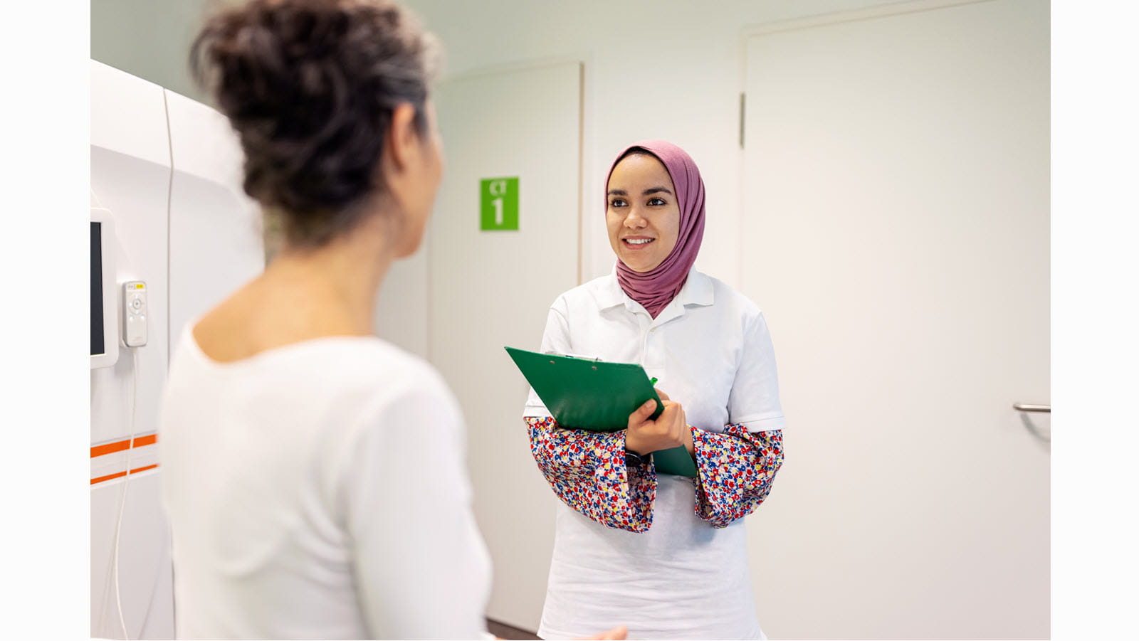 Medical staff and patient at a clinical trial encounter