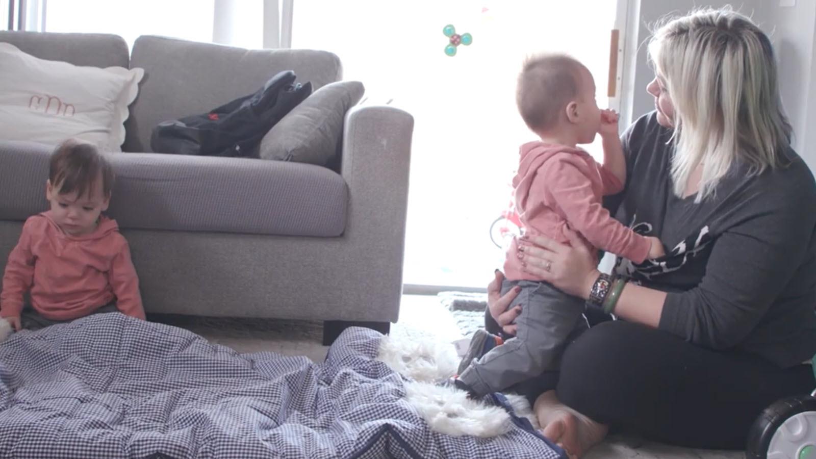 Danielle, a primary immunodeficiency patient, at home with her twin boys