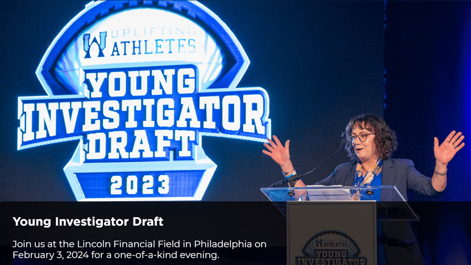 Debbie Drane, Senior Vice President for Global Commercial Development and Therapy Area Strategy, celebrates winners of research grants at an Uplifting Athletes Young Investigator Draft.