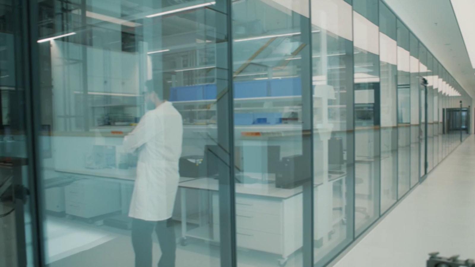 CSL R&D lab of the future where a scientist works behind a glass wall