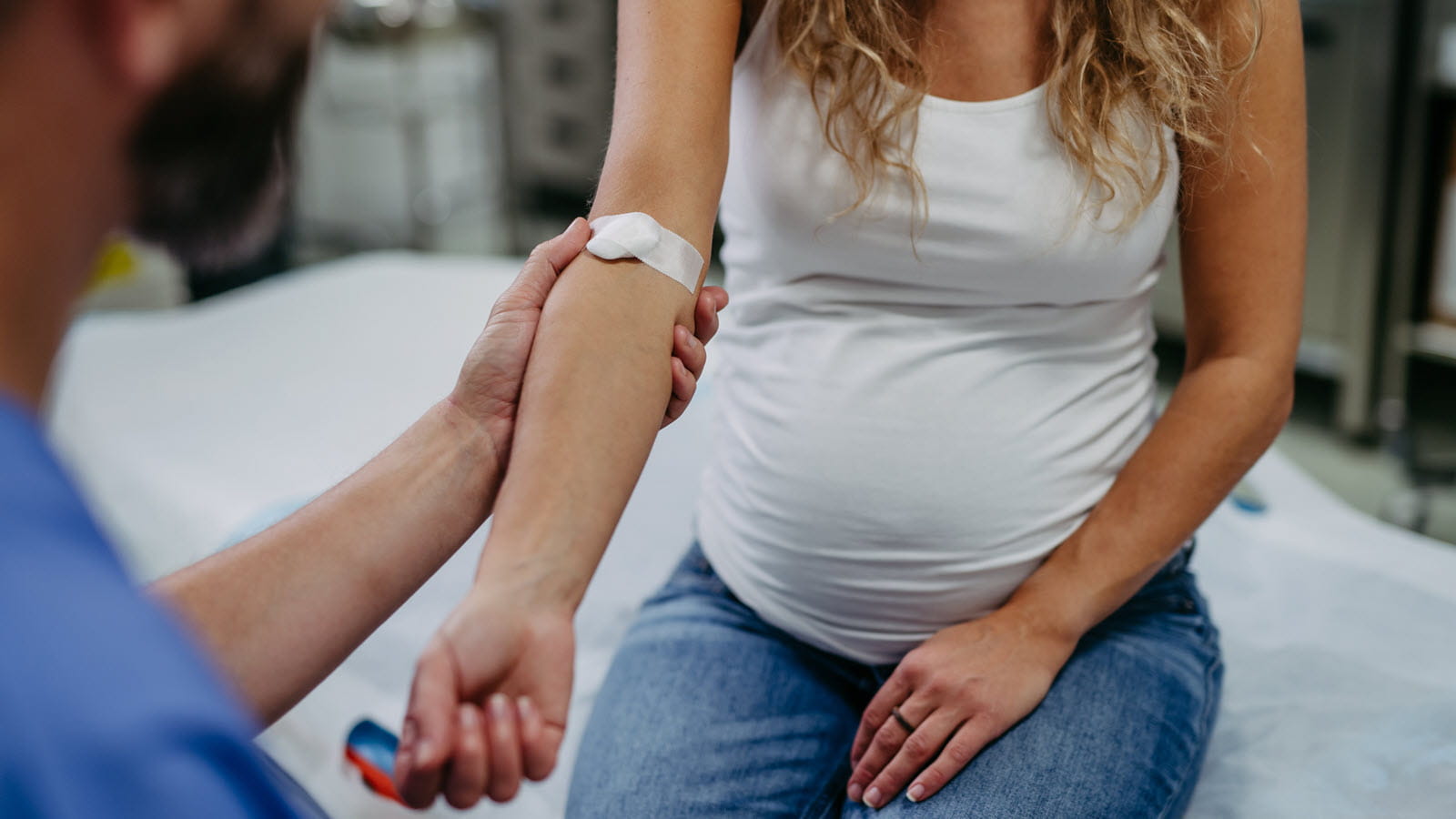 Pregnant woman getting a blood test. Women are at risk of anemia.
