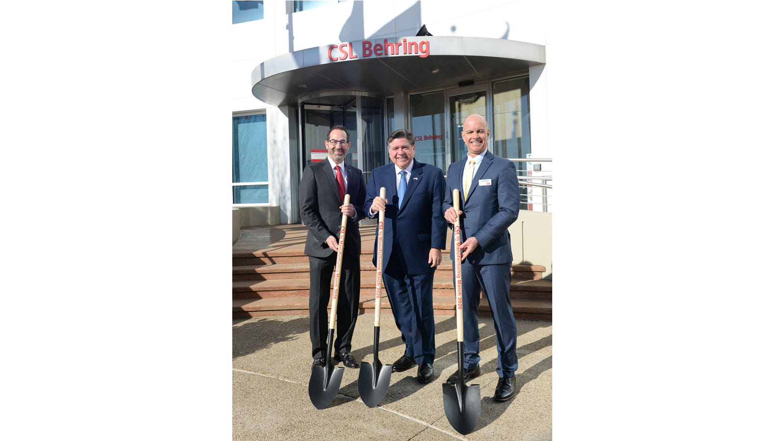 CSL Chief Commercial Officer Andy Schmeltz, Illinois Gov. JB Pritzker and Kankakee Site Head Jose Campos pose with shovels at the launch event for a $1.5 billion expansion.