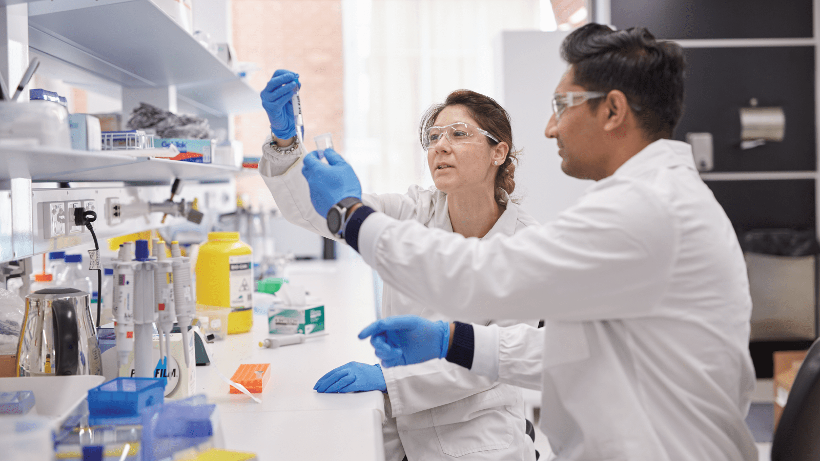 Picture of a scientist at a work station